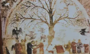 Antico affresco a Massa Marittima: un albero della vita con figure umane e uccelli, forse un racconto di antiche tradizioni.